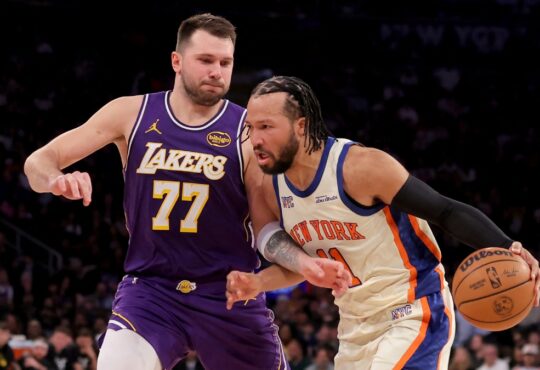 New York Knicks guard Jalen Brunson drives against Los Angeles Lakers guard Luka Dončić at Madison Square Garden