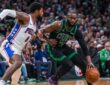 Jaylen Brown drives to the basket while defended by Paul George during a 2026 NBA playoff game between the Celtics and 76ers.