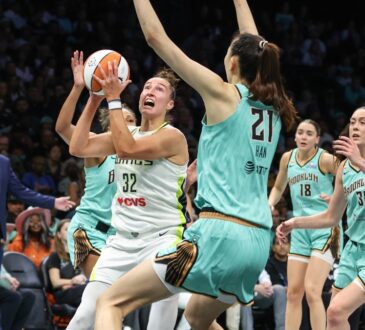 Dallas Wings forward Jessica Shepard drives to the basket against New York Liberty center Han Xu in the first quarter at Barclays Center
