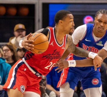 LA Clippers forward John Collins drives against Detroit Pistons guard Ausar Thompson at Little Caesars Arena