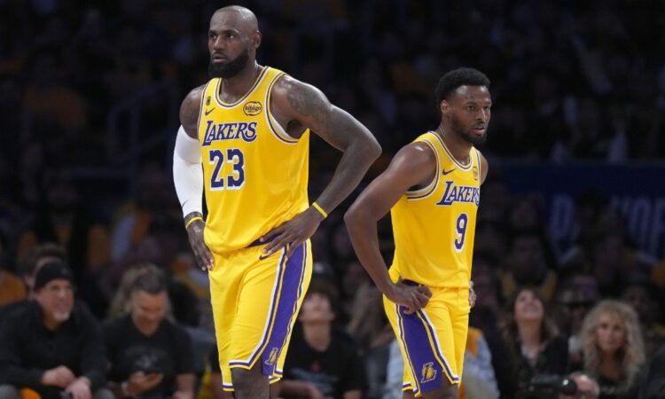 LeBron James #23 and Bronny James #9 of the Los Angeles Lakers during Game 1 of the NBA Playoffs against the Houston Rockets at Crypto.com Arena.