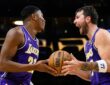 Rui Hachimura #28 and Luka Doncic #77 of the Los Angeles Lakers react after a defensive play against the Brooklyn Nets at Crypto.com Arena.