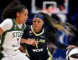 Odyssey Sims of the Dallas Wings drives past Zia Cooke of the Seattle Storm during their WNBA game on June 1, 2026