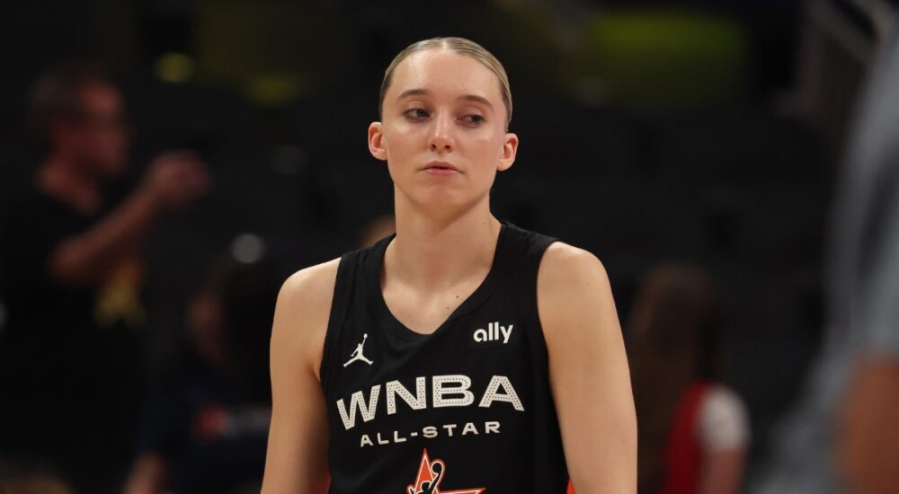 Dallas Wings guard Paige Bueckers stands on the court in her Team Collier All-Star jersey before the 2025 WNBA All-Star Game at Gainbridge Fieldhouse in Indianapolis.