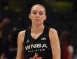 Dallas Wings guard Paige Bueckers stands on the court in her Team Collier All-Star jersey before the 2025 WNBA All-Star Game at Gainbridge Fieldhouse in Indianapolis.