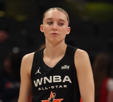 Dallas Wings guard Paige Bueckers stands on the court in her Team Collier All-Star jersey before the 2025 WNBA All-Star Game at Gainbridge Fieldhouse in Indianapolis.