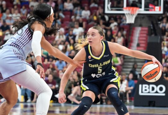 Dallas Wings guard Paige Bueckers drives with the ball as Toronto Tempo forward Isabelle Harrison defends during the first half at Bell Centre.