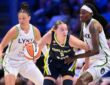 Paige Bueckers of the Dallas Wings drives to the basket against Natasha Howard of the Minnesota Lynx during their WNBA game on June 28, 2026