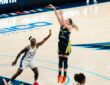 Dallas Wings guard Paige Bueckers #5 shoots over a Los Angeles Sparks defender during a WNBA game at College Park Center in Arlington, Texas.