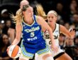 Paige Bueckers dribbles past Chicago Sky guard Jacy Sheldon during the second half at American Airlines Center on July 12, 2026
