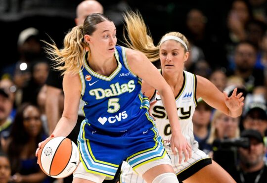 Paige Bueckers dribbles past Chicago Sky guard Jacy Sheldon during the second half at American Airlines Center on July 12, 2026