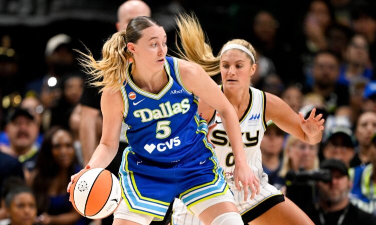 Paige Bueckers dribbles past Chicago Sky guard Jacy Sheldon during the second half at American Airlines Center on July 12, 2026