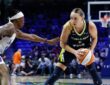 Dallas Wings guard Paige Bueckers controls the ball as Los Angeles Sparks guard Erica Wheeler defends during a game at College Park Center.