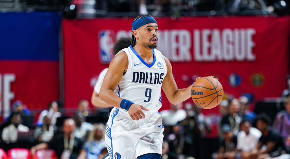Ryan Nembhard dribbles up court for the Dallas Mavericks with Morez Johnson Jr. trailing during 2026 NBA Summer League.
