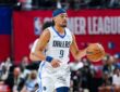 Ryan Nembhard dribbles up court for the Dallas Mavericks with Morez Johnson Jr. trailing during 2026 NBA Summer League.