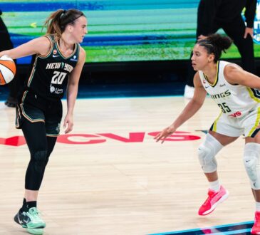New York Liberty guard Sabrina Ionescu dribbles the ball as Dallas Wings guard Azzi Fudd defends during their game at College Park Center.