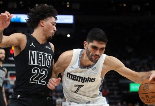 Memphis Grizzlies forward Santi Aldama drives to the basket against Brooklyn Nets forward Jalen Wilson during a game at FedExForum