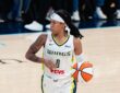 Dallas Wings guard Sug Sutton #0 dribbles up the court against the New York Liberty during a WNBA game at College Park Center in Arlington, Texas.