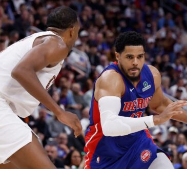 Detroit Pistons forward Tobias Harris drives with the ball against Cleveland Cavaliers center Evan Mobley during a 2026 NBA Playoffs game.