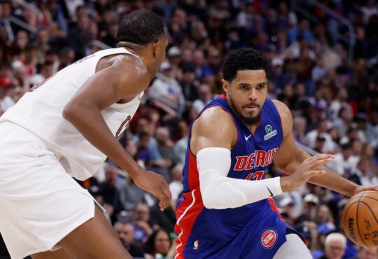 Detroit Pistons forward Tobias Harris drives with the ball against Cleveland Cavaliers center Evan Mobley during a 2026 NBA Playoffs game.