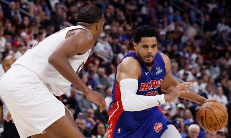 Detroit Pistons forward Tobias Harris drives with the ball against Cleveland Cavaliers center Evan Mobley during a 2026 NBA Playoffs game.